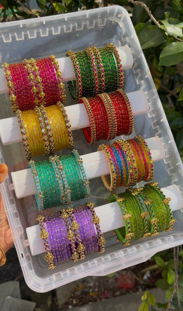 Gorgeous 8 sets Silkthread mixed with raindrop glass bangles
