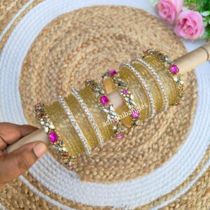 Dark pink stone set with pastel green glass bangles