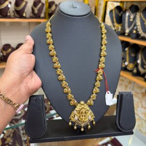 Lakshmi with peacock haram