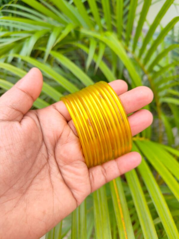 Plain glossy glass bangles (Kuppivala) Yellow color