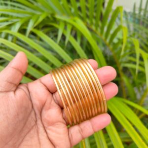 Plain glossy glass bangles (Kuppivala) Light gold color